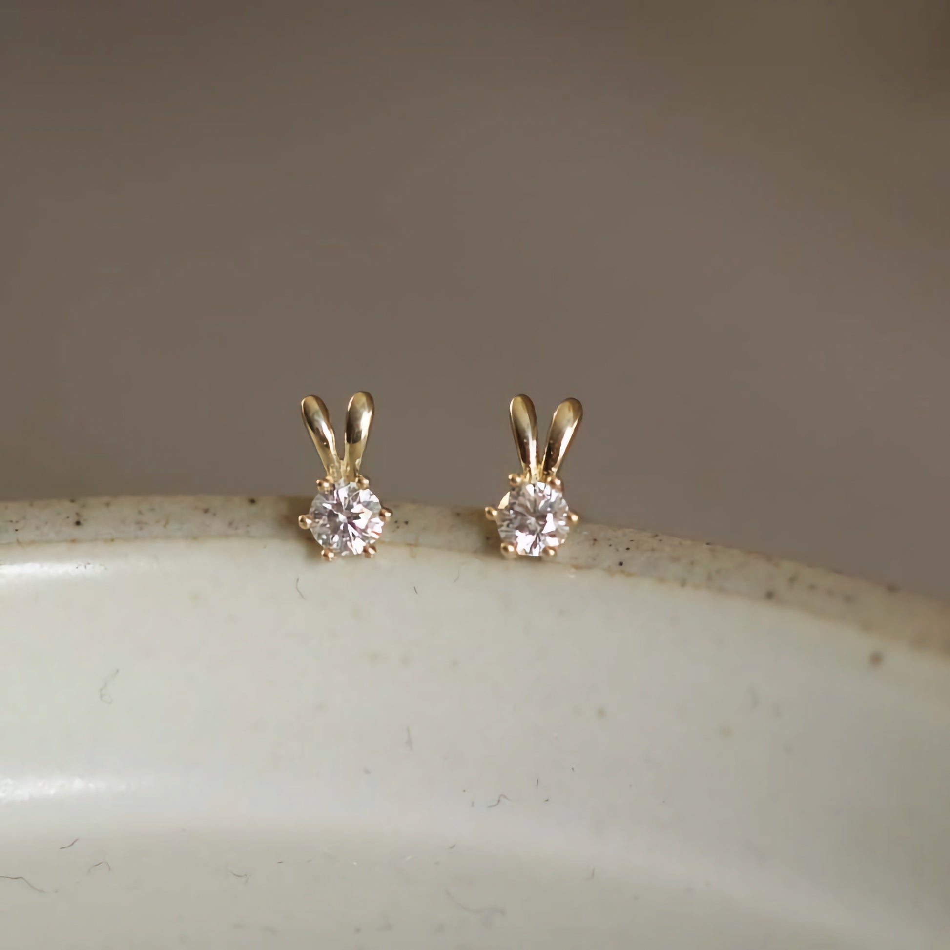 Two adorable 9ct solid gold bunny ears studs, uniquely handcrafted to bring joy and fun to your style.