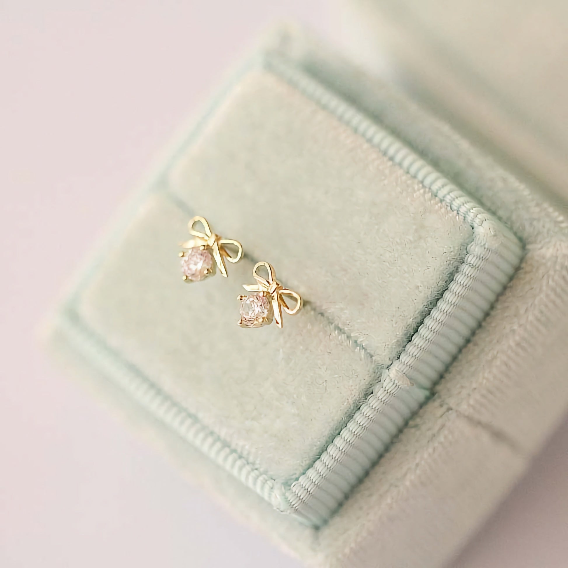Adorn yourself with 9ct Solid Gold Bowtie Hearts Earrings - A symbol of love and elegance, perfect for expressing your affectionate side.